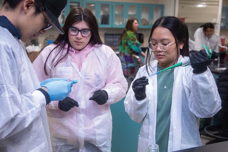 Students learning how to use the equipment in the School of Science, Math and Engineering at San Juan College!